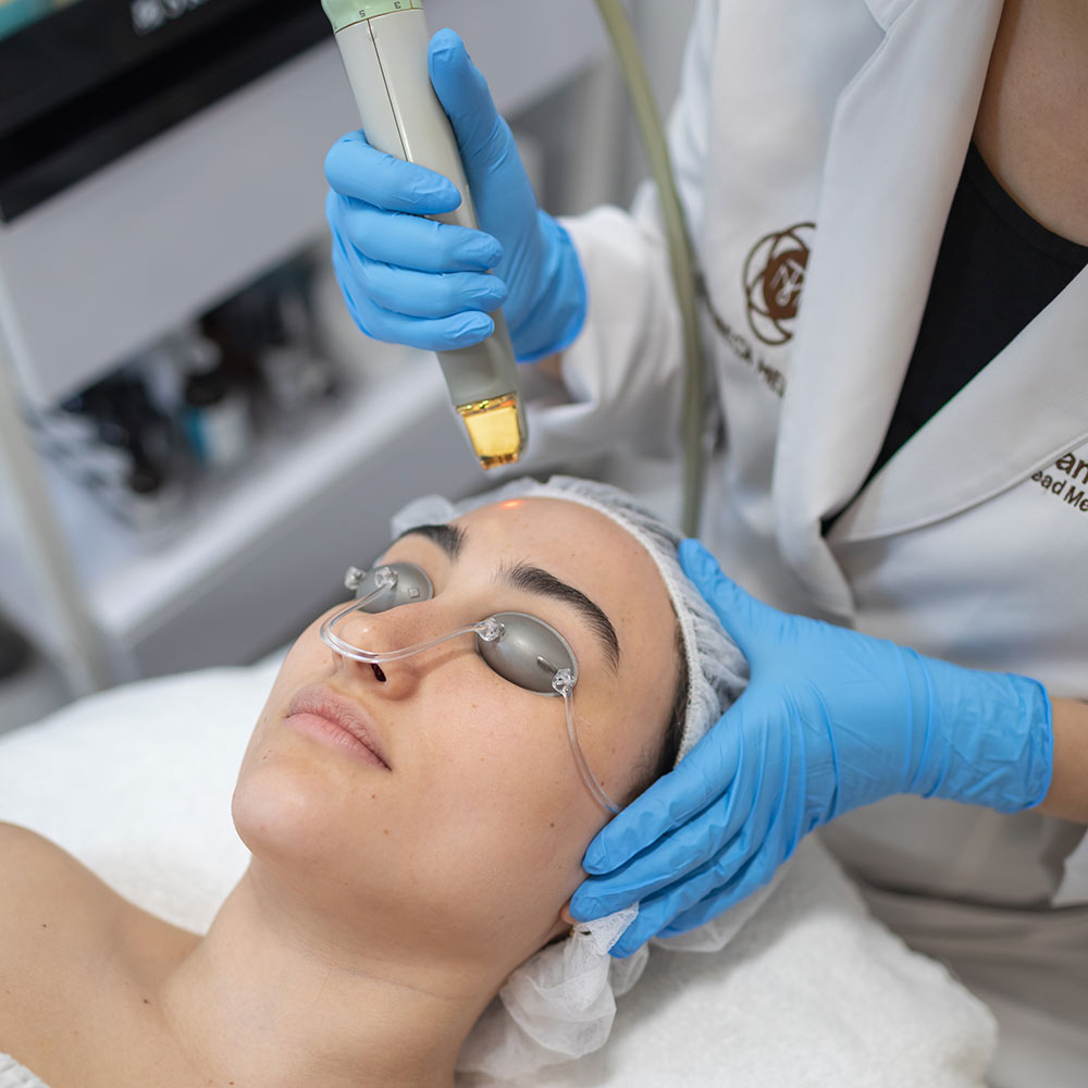 Close-up of a woman getting a laser treatment